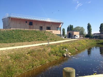 PhotoEco-construction bois du batiment d'exploitation bioclimatique àénergie positive de la station d'épuration d'Aubevoye